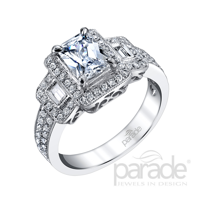 Three stone fancy shape diamond engagement ring.