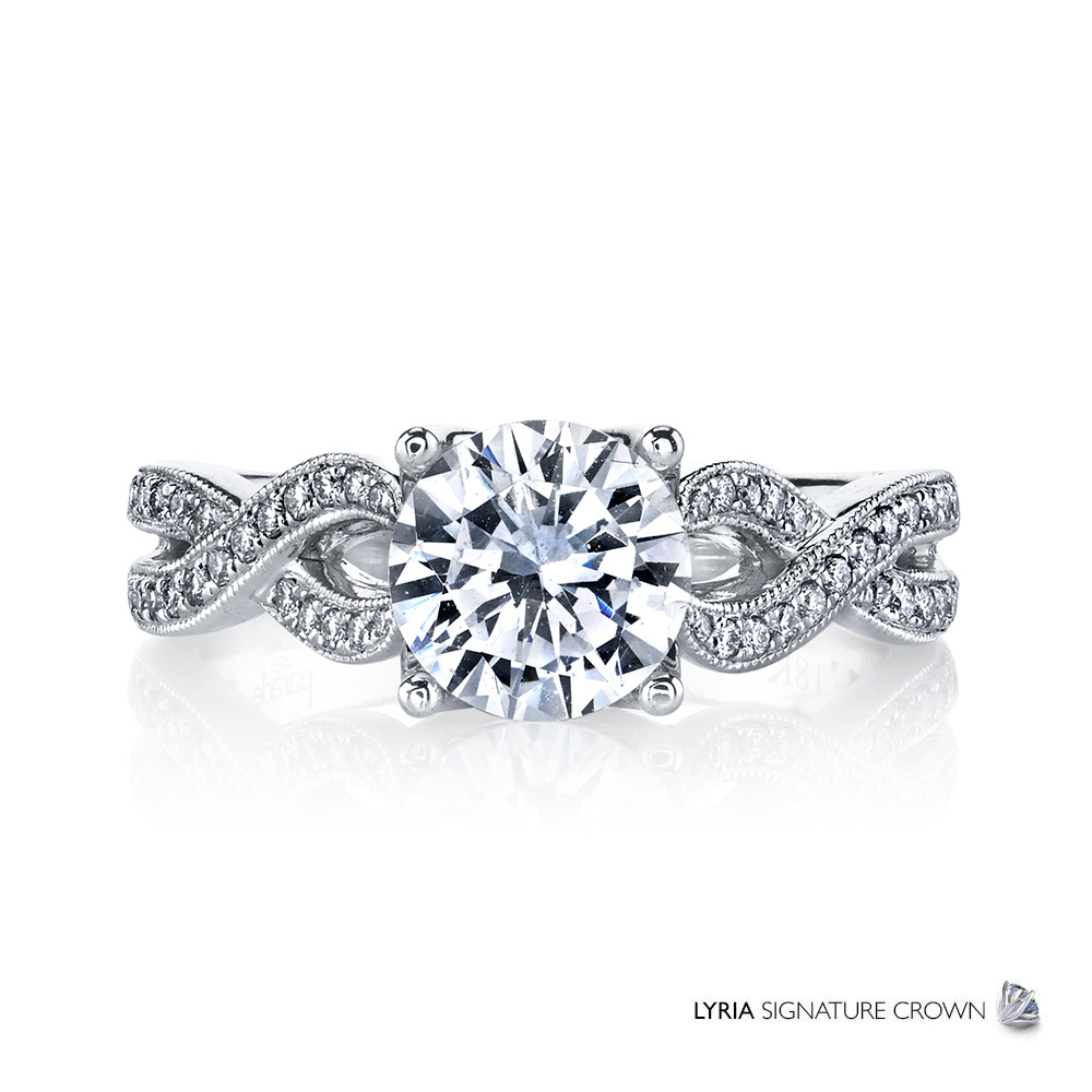 Contemporary designer diamond engagement ring featuring the Lyria Signature Crown.