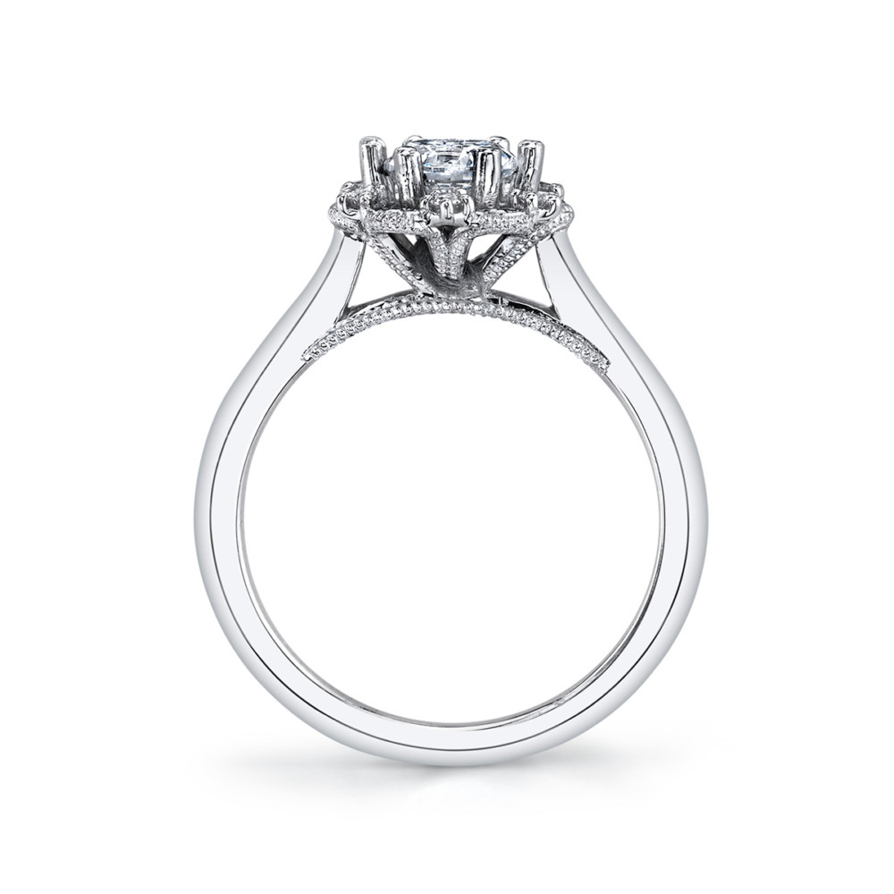 Vintage designer diamond halo engagement ring by Parade Design.