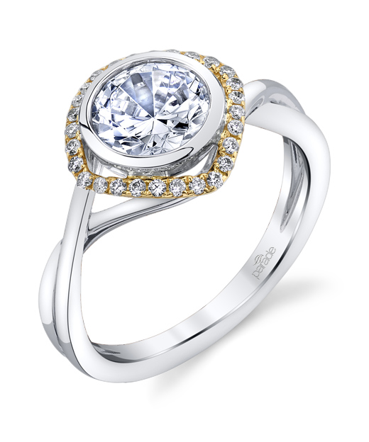 Contemporary designer diamond bezel set halo engagement ring by Parade Design.